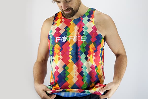 man finishing to put on a reversible jersey